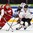 HELSINKI, FINLAND - JANUARY 2: Belarus' Dmitri Buinitski #10 battles for the puck with Switzerland's Calvin Thurkauf #12 during relegation round action at the 2016 IIHF World Junior Championship. (Photo by Matt Zambonin/HHOF-IIHF Images)

